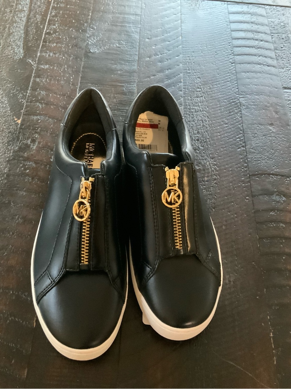 Michael Kors womens  Black Slip-On Sneakers with Gold Zip size 5.5  sku 3233